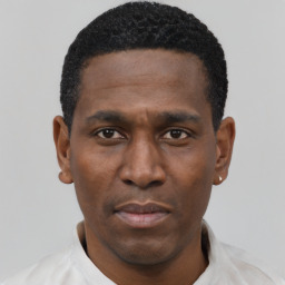 Neutral black young-adult male with short  black hair and brown eyes