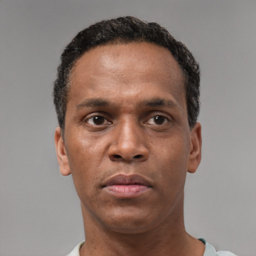 Neutral black young-adult male with short  brown hair and brown eyes