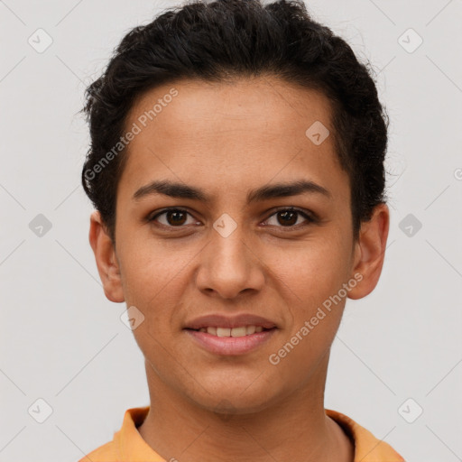 Joyful latino young-adult female with short  brown hair and brown eyes