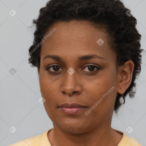 Neutral black young-adult female with short  brown hair and brown eyes