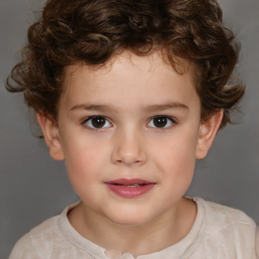 Joyful white child male with medium  brown hair and brown eyes