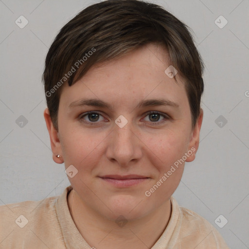 Joyful white young-adult female with short  brown hair and grey eyes