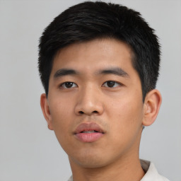 Neutral asian young-adult male with short  black hair and brown eyes