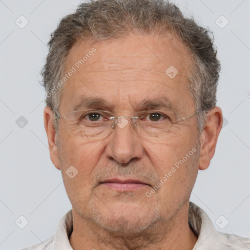 Neutral white middle-aged male with short  brown hair and brown eyes