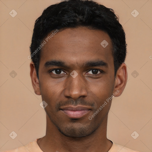 Joyful black young-adult male with short  black hair and brown eyes