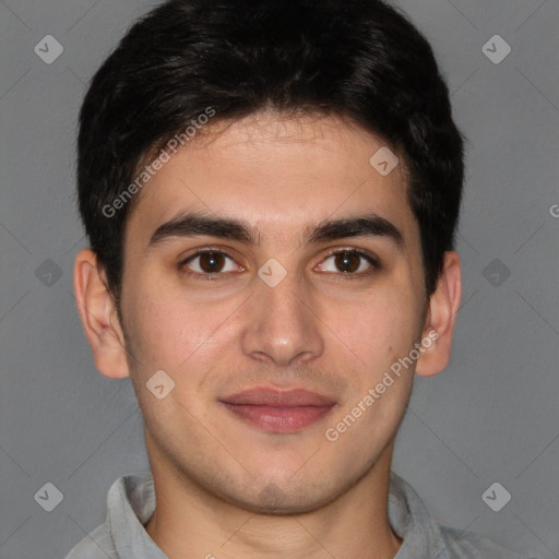 Joyful latino young-adult male with short  brown hair and brown eyes