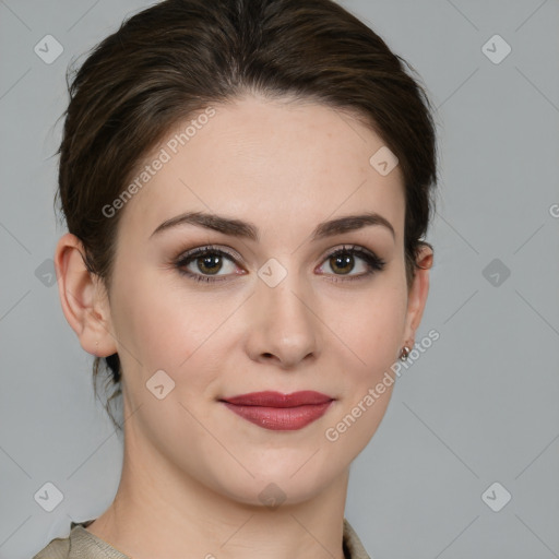 Joyful white young-adult female with medium  brown hair and green eyes