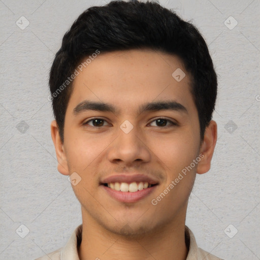 Joyful latino young-adult male with short  black hair and brown eyes