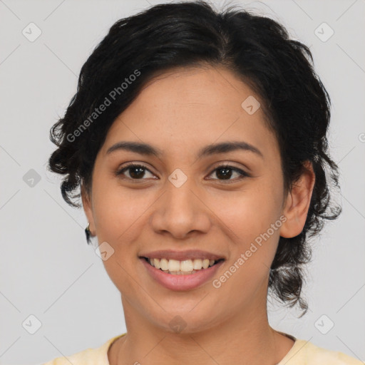 Joyful latino young-adult female with medium  black hair and brown eyes