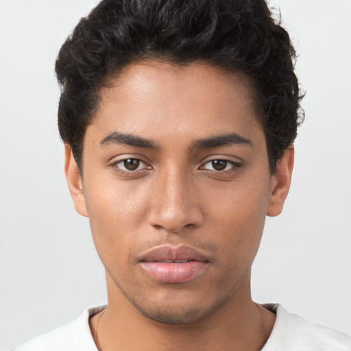 Neutral latino young-adult male with short  brown hair and brown eyes