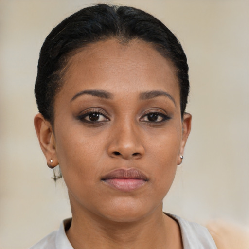 Neutral latino young-adult female with short  brown hair and brown eyes
