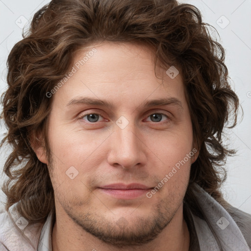 Joyful white young-adult male with medium  brown hair and brown eyes