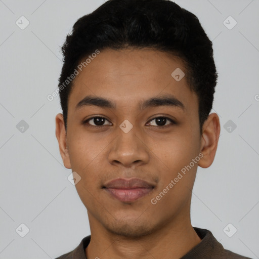 Neutral latino young-adult male with short  black hair and brown eyes