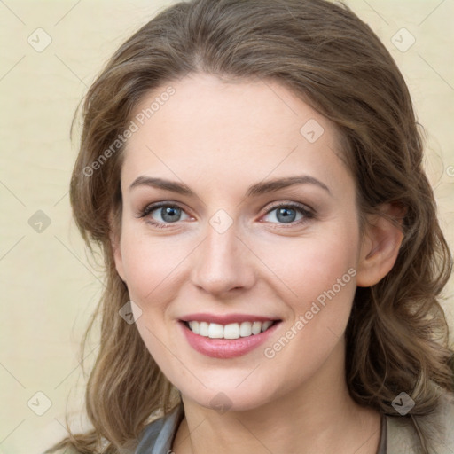 Joyful white young-adult female with medium  brown hair and green eyes