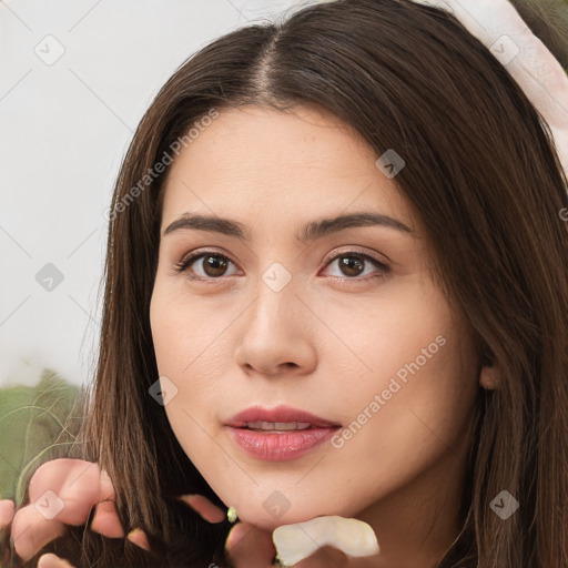 Neutral white young-adult female with long  brown hair and brown eyes