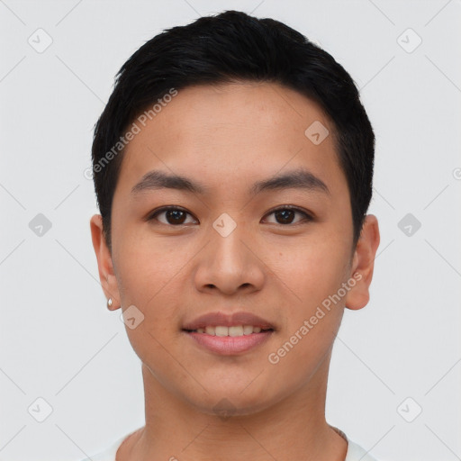 Joyful asian young-adult male with short  black hair and brown eyes