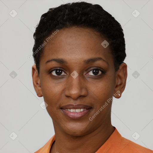 Joyful black young-adult female with short  black hair and brown eyes