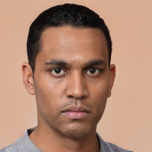 Neutral latino young-adult male with short  black hair and brown eyes