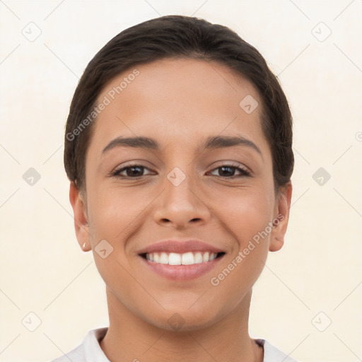 Joyful white young-adult female with short  brown hair and brown eyes