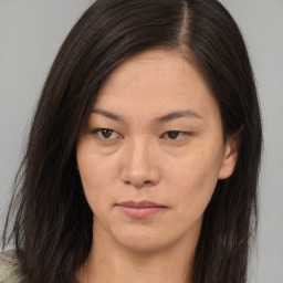 Neutral asian young-adult female with long  brown hair and brown eyes