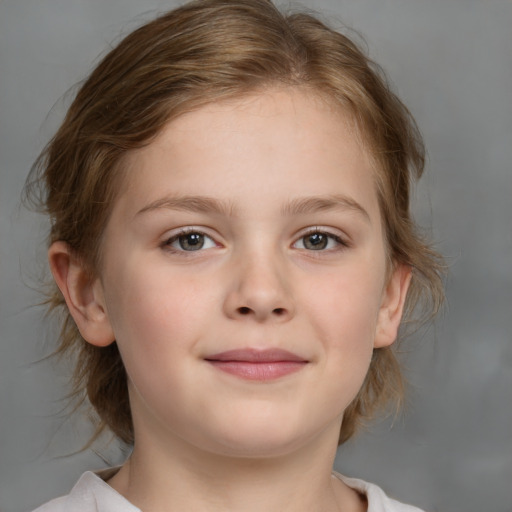 Joyful white child female with medium  brown hair and brown eyes