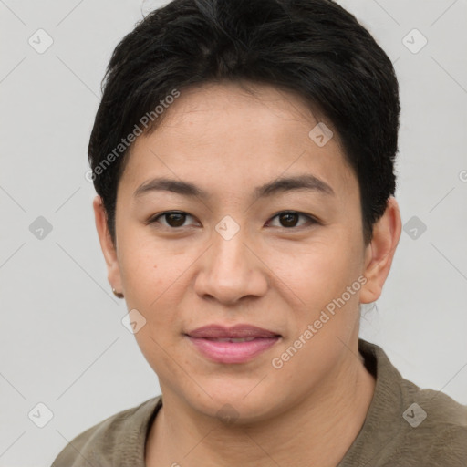 Joyful asian young-adult female with short  brown hair and brown eyes