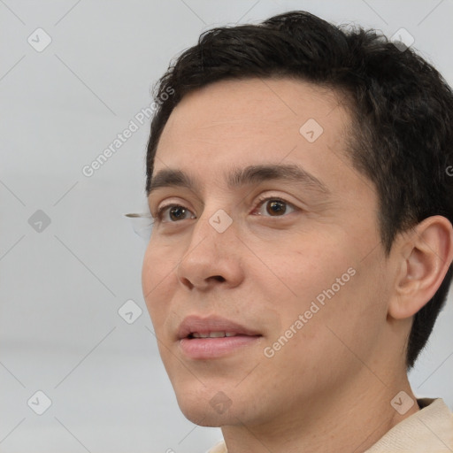 Neutral white young-adult male with short  brown hair and brown eyes