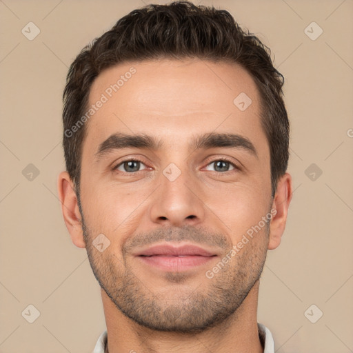 Joyful white young-adult male with short  brown hair and brown eyes