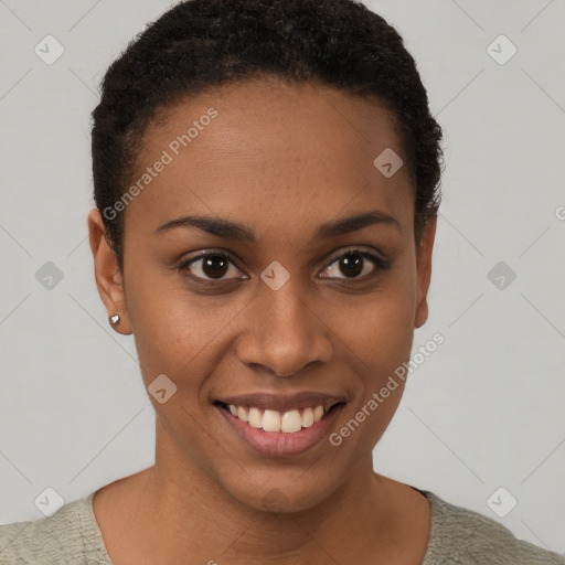 Joyful black young-adult female with short  brown hair and brown eyes