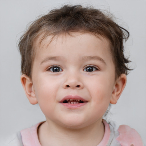 Joyful white child male with short  brown hair and brown eyes