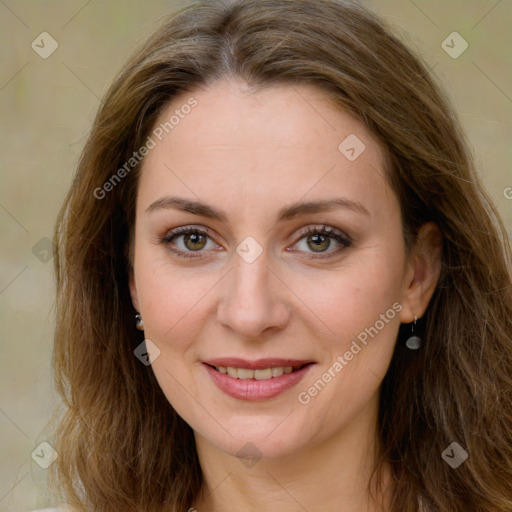 Joyful white young-adult female with long  brown hair and green eyes