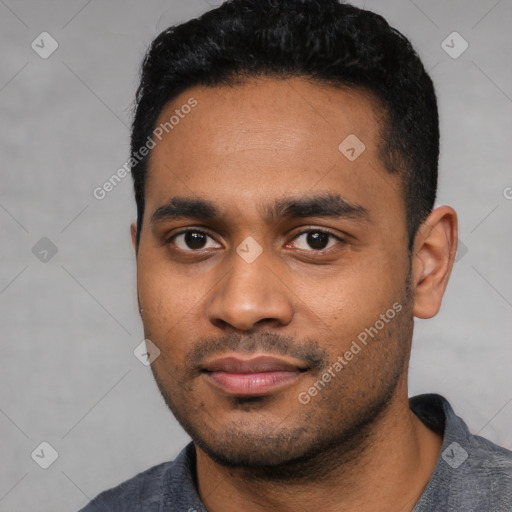 Joyful latino young-adult male with short  black hair and brown eyes