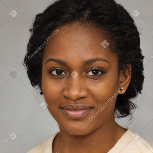 Joyful black young-adult female with long  black hair and brown eyes