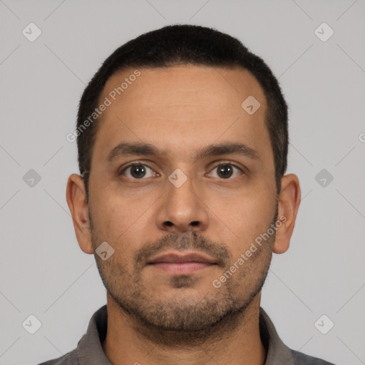 Neutral latino young-adult male with short  black hair and brown eyes