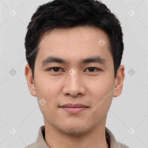 Joyful white young-adult male with short  black hair and brown eyes