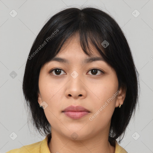 Neutral asian young-adult female with medium  brown hair and brown eyes