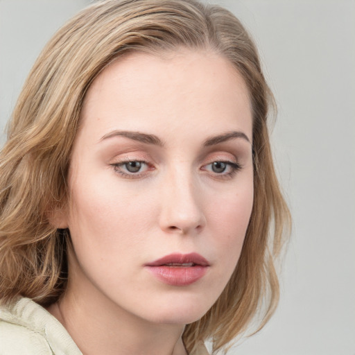 Neutral white young-adult female with medium  brown hair and grey eyes