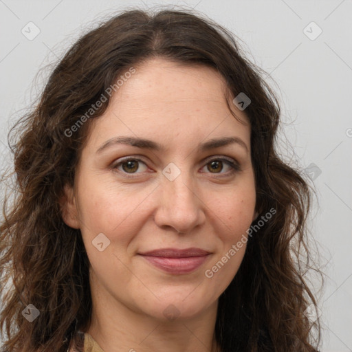 Joyful white adult female with long  brown hair and brown eyes