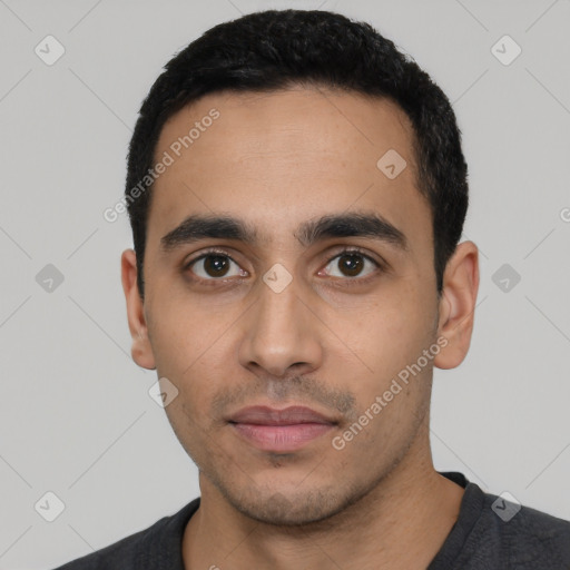 Neutral latino young-adult male with short  black hair and brown eyes