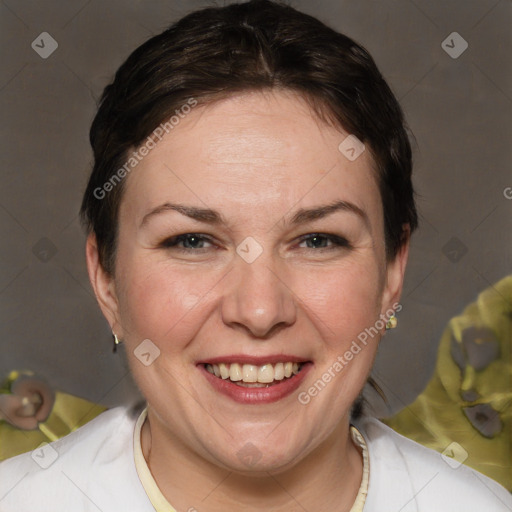 Joyful white adult female with short  brown hair and brown eyes