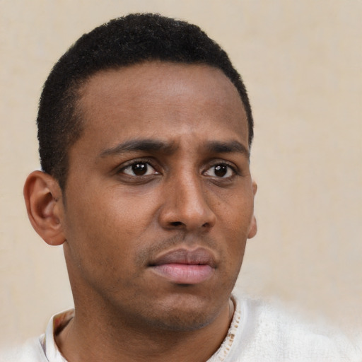 Neutral latino young-adult male with short  brown hair and brown eyes