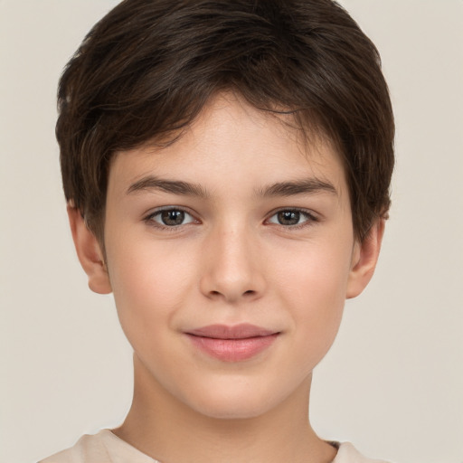 Joyful white child female with short  brown hair and brown eyes