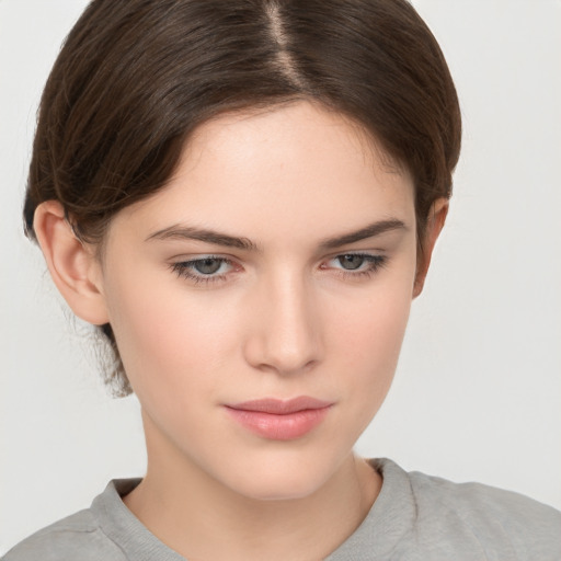 Neutral white young-adult female with short  brown hair and brown eyes