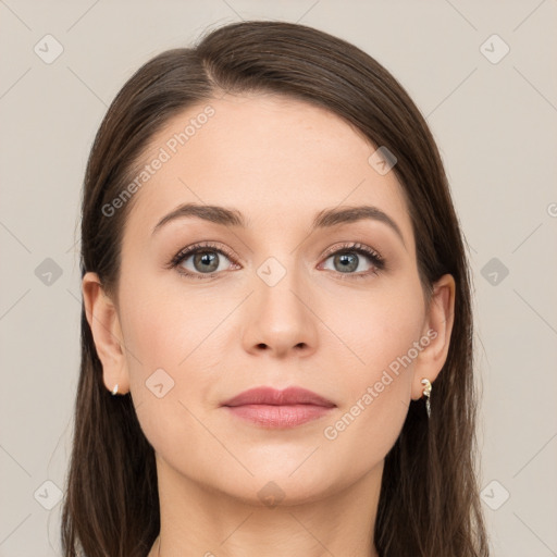 Joyful white young-adult female with long  brown hair and grey eyes