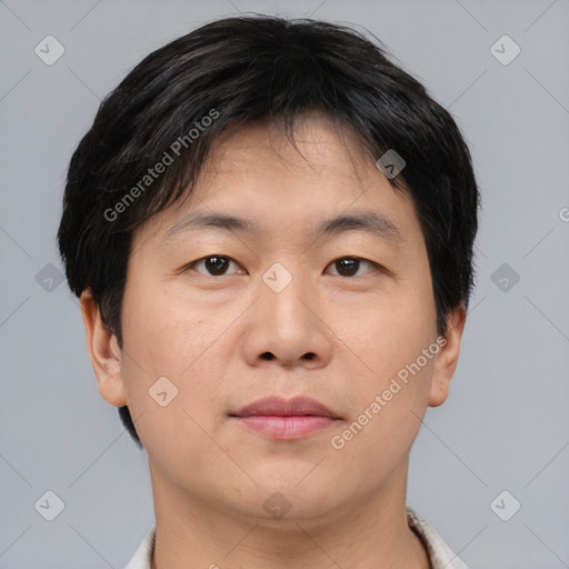 Neutral asian young-adult male with short  brown hair and brown eyes