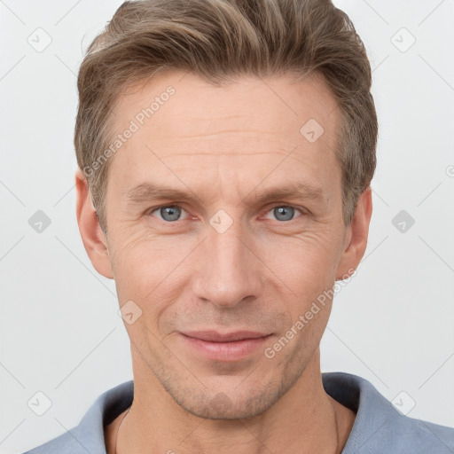 Joyful white adult male with short  brown hair and grey eyes