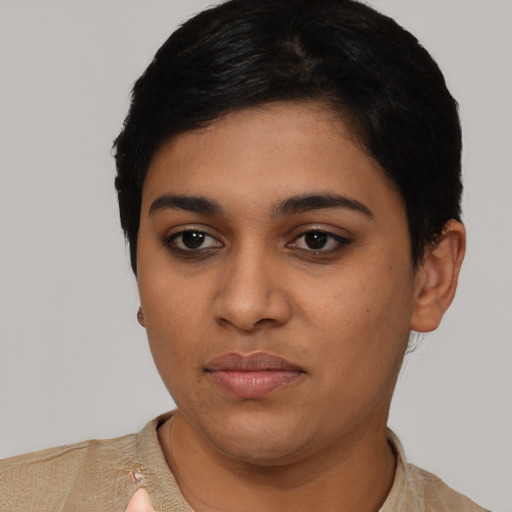 Neutral latino young-adult female with short  black hair and brown eyes