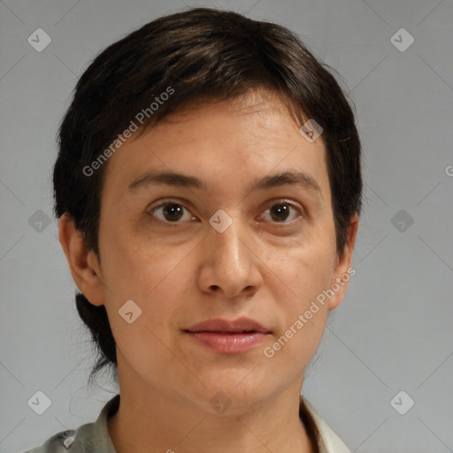 Joyful white adult female with short  brown hair and brown eyes