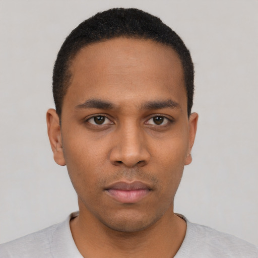 Neutral black young-adult male with short  black hair and brown eyes