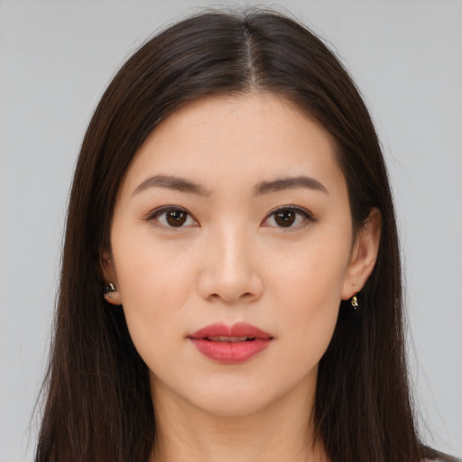 Neutral asian young-adult female with long  brown hair and brown eyes